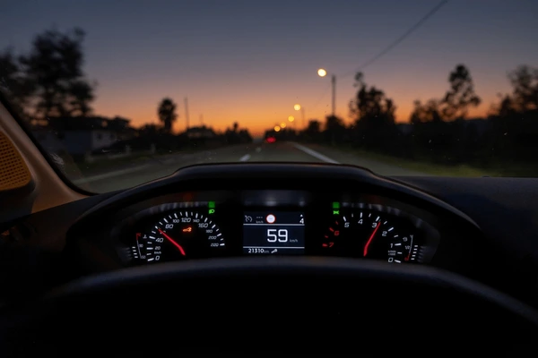 Driver’s POV shot showing digital dash mid-launch